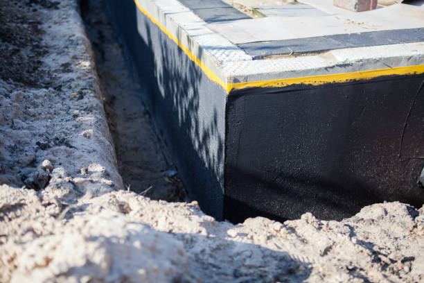 Professional Interior Drainage System technician working in Woodburn, VA